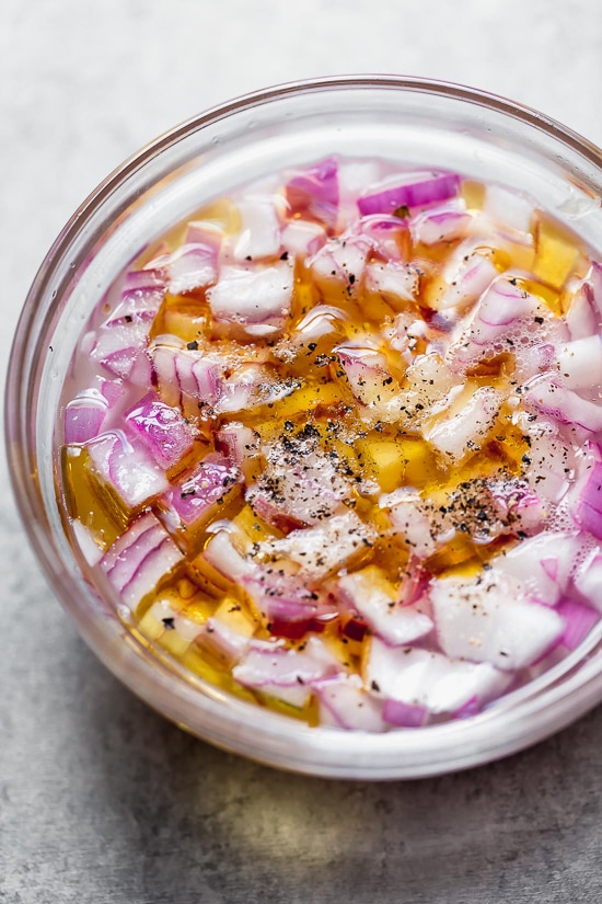 Soad red onion in lime juice and salt to mellow the flavor.