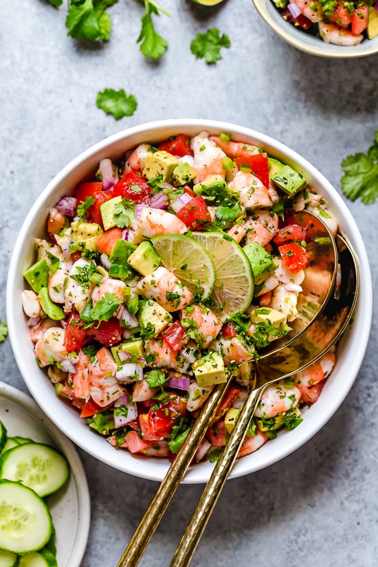 Zesty Lime Shrimp and Avocado Salad, a light and refreshing salad that requires no cooking! Lime juice and cilantro are the key ingredients to creating this wonderful, healthy salad you'll want to make all summer long.
