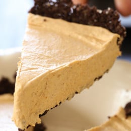 No Bake Pumpkin Cheesecake is an easy, light cheesecake made with pumpkin puree and spices. Under 10 minutes to make, if you use ready-made crust.