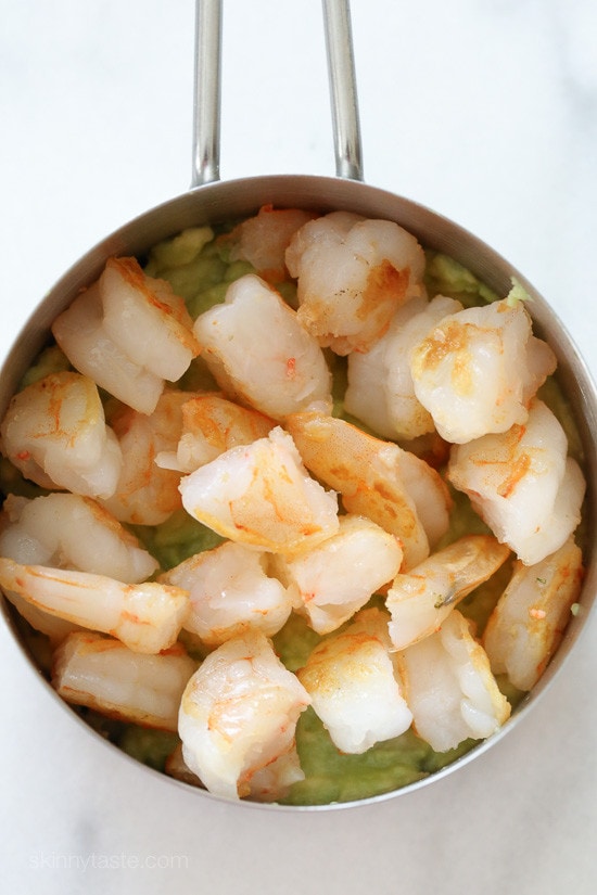 These EASY, Spicy California Shrimp Stacks will satisfy your sushi craving, and they taste SO GOOD! Layered with cucumber, avocado, shrimp and brown rice, then topped with a spicy mayo – YUM!