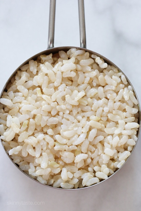 These EASY, Spicy California Shrimp Stacks will satisfy your sushi craving, and they taste SO GOOD! Layered with cucumber, avocado, shrimp and brown rice, then topped with a spicy mayo – YUM!