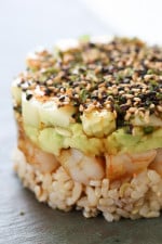 These EASY, Spicy California Shrimp Stacks will satisfy your sushi craving, and they taste SO GOOD! Layered with cucumber, avocado, shrimp and brown rice, then topped with a spicy mayo – YUM!