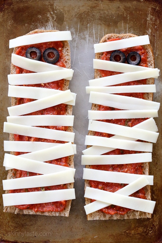French Bread Pizza Mummies French Bread Pizza Mummies – perfect EASY recipe for your Halloween Party, just 4 ingredients and 15 minutes to make!