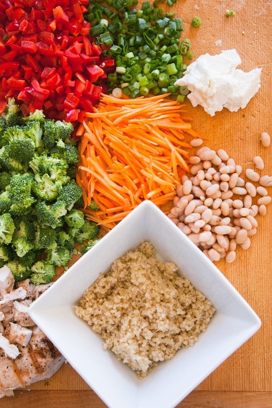Seattle Sunshine Bowl Seattle Sunshine Bowl – a bowl of goodness – quinoa, grilled chicken, white beans, chopped veggies, pumpkin seeds, feta, and scallions, all topped with a yellow Sunshine Sauce.
