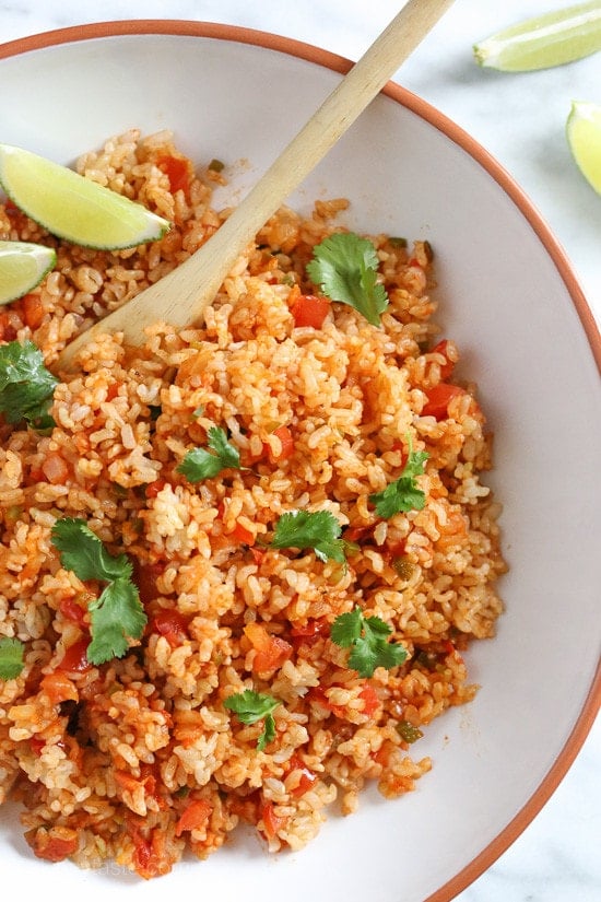 Quick Mexican Brown Rice This Quick Mexican Brown Rice is the perfect side dish that goes with everything from tacos, enchiladas, refried beans –you name it!