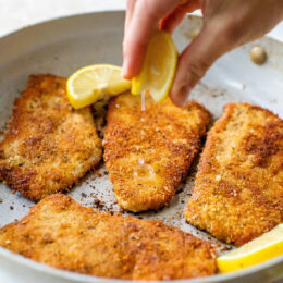 Lemon squeezed over turkey cutlets