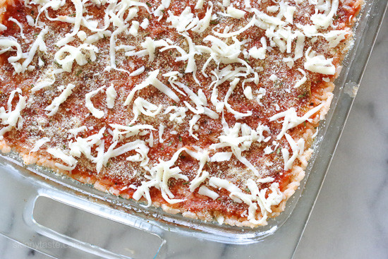 Sicilian Rice Ball Casserole filled with ground turkey and a little sausage adds lots of flavor, plus peas and sauce. Freezes well, great for potlucks and family friendly!