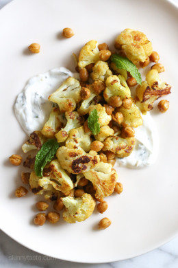 In an effort to still enjoy the flavors yet lighten things up a bit, I decided to create this roasted cauliflower and chickpea dish with minty yogurt. It’s great for lunch or as a side dish with dinner.