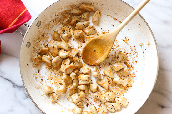Chicken and Zucchini Noodle Caprese is made with sauteed bite-sized chicken breast and grape tomatoes cooked with spiralized zucchini, fresh mozzarella and basil. An easy, low-carb 30-minute meal!