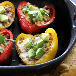 Bell peppers stuffed with my ever-so-popular Crock Pot Chicken Taco Chili and topped with cheese – easy and SO good!I love a recipe that can turn into several dishes to use throughout the month.