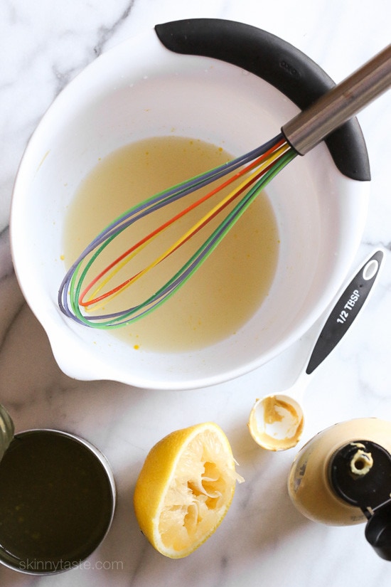 This EASY Skillet Chicken Cordon Bleu recipe is made with thin sliced boneless chicken cutlets, lightly pan fried then topped with ham and Swiss in a light Lemon-Dijon Sauce. No rolling!