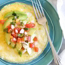 I'm pretty obsessed with making open-faced omelets and make them all the time topped with whatever I have on hand (you may remember this tomato and feta omelet). Since I always have avocados on hand, and I had some leftover pico de gallo from this recipe, I've been whipping this up all week!