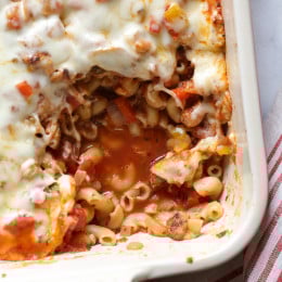 Chicken sausage, bell peppers, onions and mushrooms simmered in a marinara sauce then baked in the casserole with whole wheat macaroni topped with mozzarella.