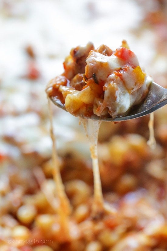 Chicken Sausage and Peppers Macaroni Casserole Chicken sausage, bell peppers, onions and mushrooms simmered in a marinara sauce then baked in the casserole with whole wheat macaroni topped with mozzarella.