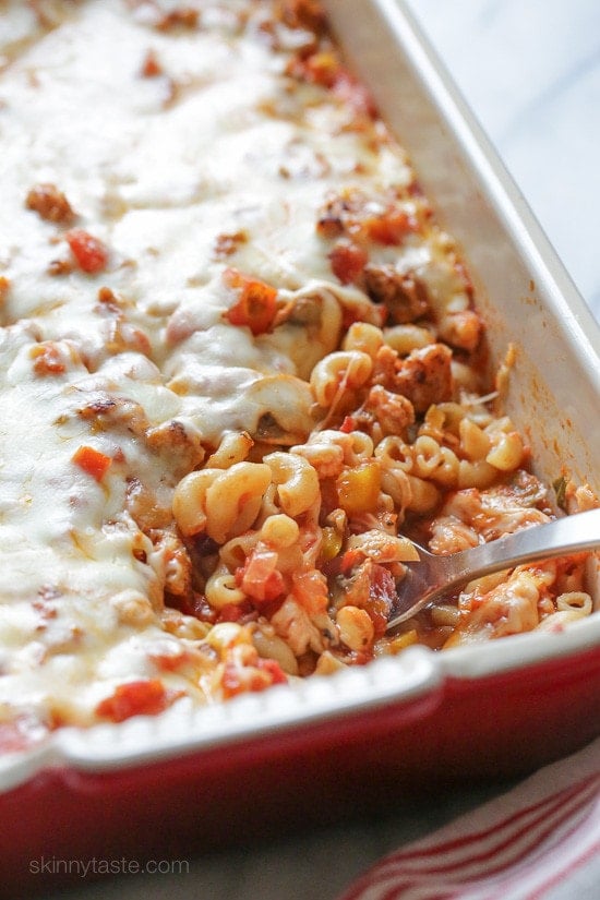 Chicken Sausage and Peppers Macaroni Casserole Chicken sausage, bell peppers, onions and mushrooms simmered in a marinara sauce then baked in the casserole with whole wheat macaroni topped with mozzarella.