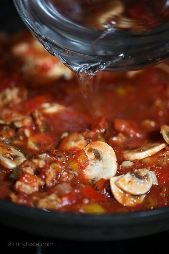 Chicken sausage, bell peppers, onions and mushrooms simmered in a marinara sauce then baked in the casserole with whole wheat macaroni topped with mozzarella.