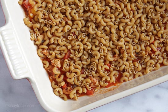 Chicken sausage, bell peppers, onions and mushrooms simmered in a marinara sauce then baked in the casserole with whole wheat macaroni topped with mozzarella.