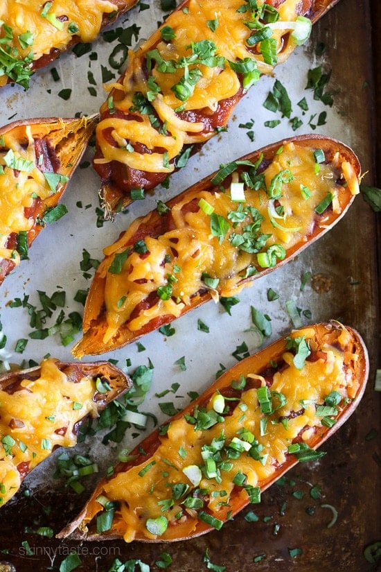 These cheesy baked sweet potato skins are loaded with fat free black refried beans, salsa and cheddar cheese. Just a few ingredients but they taste SO good!
