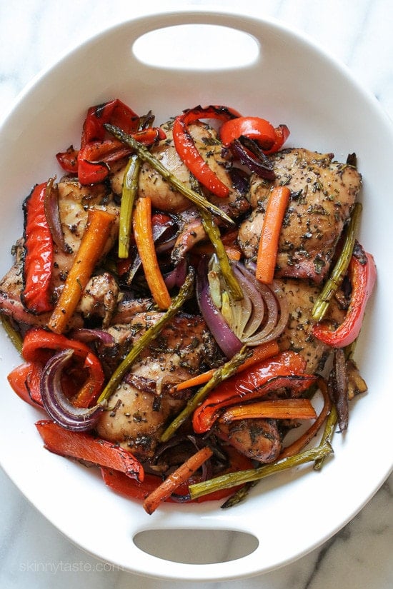 The BEST chicken recipe and one of my most popular! Balsamic Chicken with Roasted Vegetables seasoned with sage, rosemary and balsamic vinegar, then baked in the oven. A delicious healthy meal-in-one! Smart Points: 8 Calories: 401