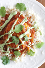 A quick Mexican-inspired chicken dish, made in the skillet with a smoky-spicy tomato-chipotle sauce topped with an avocado-sour cream sauce.