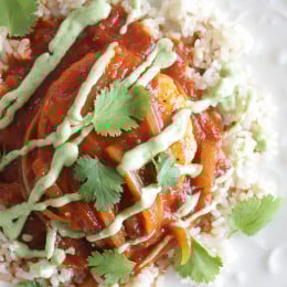 A quick Mexican-inspired chicken dish, made in the skillet with a smoky-spicy tomato-chipotle sauce topped with an avocado-sour cream sauce.