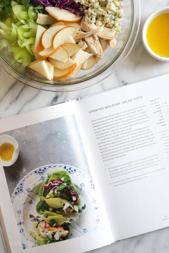 Updated Waldorf Salad Cups Updated Waldorf Salad Cups – a lighter take on the classic Waldorf Salad served in lettuce leaves so you can eat them with your hands instead of a fork!