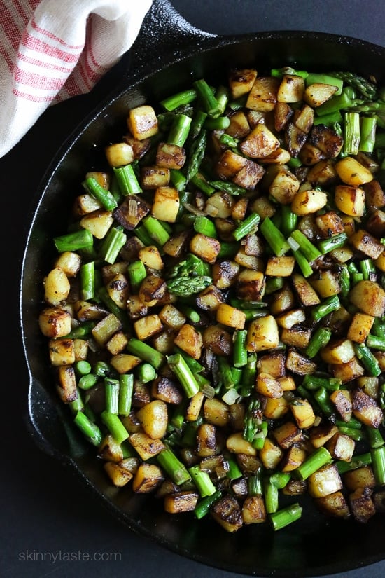 This Spring breakfast hash recipe is made with a combination of sauteed asparagus, diced Yukon gold potatoes, pancetta and shallots then topped with an egg.