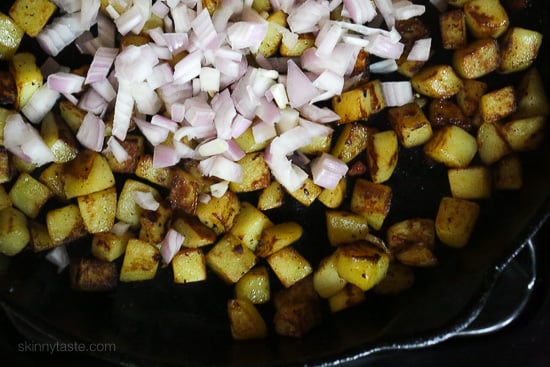 This Spring breakfast hash recipe is made with a combination of sauteed asparagus, diced Yukon gold potatoes, pancetta and shallots then topped with an egg.