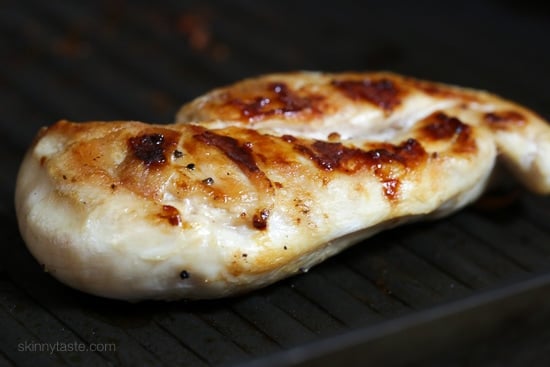 These easy loaded chicken "nacho" tostadas – topped with cheese, tomatoes, guacamole, olives and jalapenos are a great way to take nachos and turn them into a main dish.