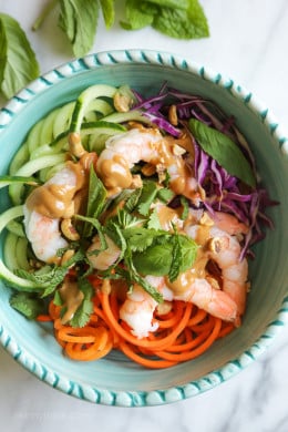 These quick and easy Spiralized Summer Roll Bowls with Hoisin Peanut Sauce made with spiralized carrots and cucumbers were inspired by my shrimp summer rolls. I wanted to take those yummy rolls (which can be a bit more time consuming) and turn them into a super-quick meal, less than 10 minutes!