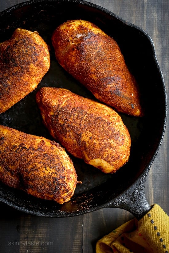 Blackened Chicken Fiesta Salad Blackened Chicken over a flavorful chickpea salad with fresh corn, tomatoes, avocado and lime juice. A quick and easy weeknight dish!