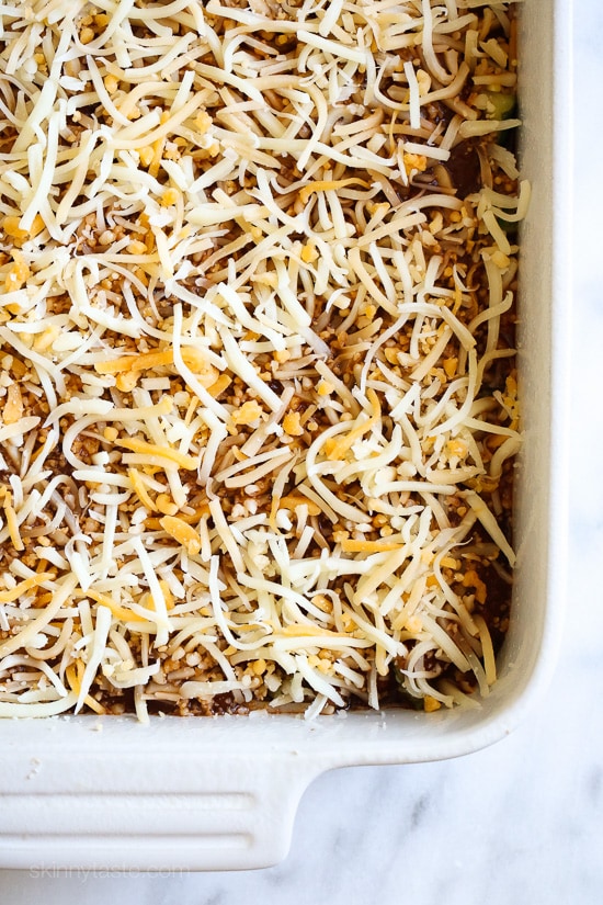 Late Summer Vegetable Enchilada Pie – A saucy, lasagna-like Mexican-American casserole layered with vegetables, tortillas, sauce and cheese.