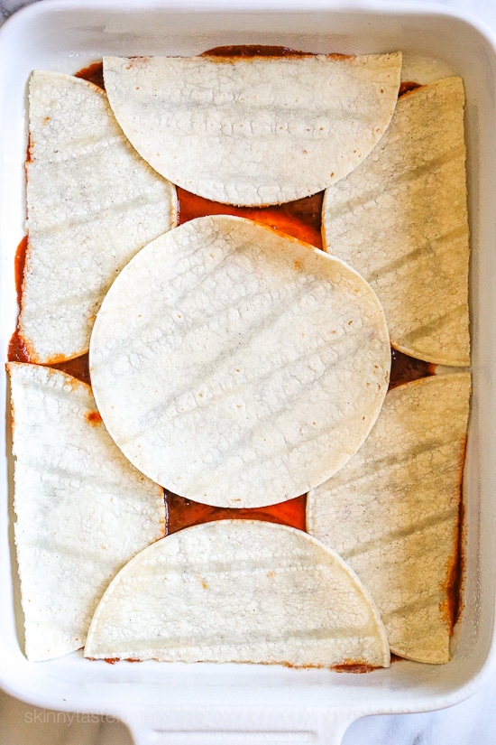 Late Summer Vegetable Enchilada Pie – A saucy, lasagna-like Mexican-American casserole layered with vegetables, tortillas, sauce and cheese.