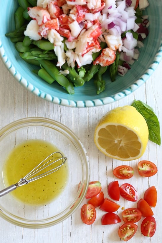 This delicious, easy salad features succulent lobster tossed with chopped asparagus and tomatoes in a light lemon dressing. To save time, I buy the lobsters steamed from my local fishmonger.