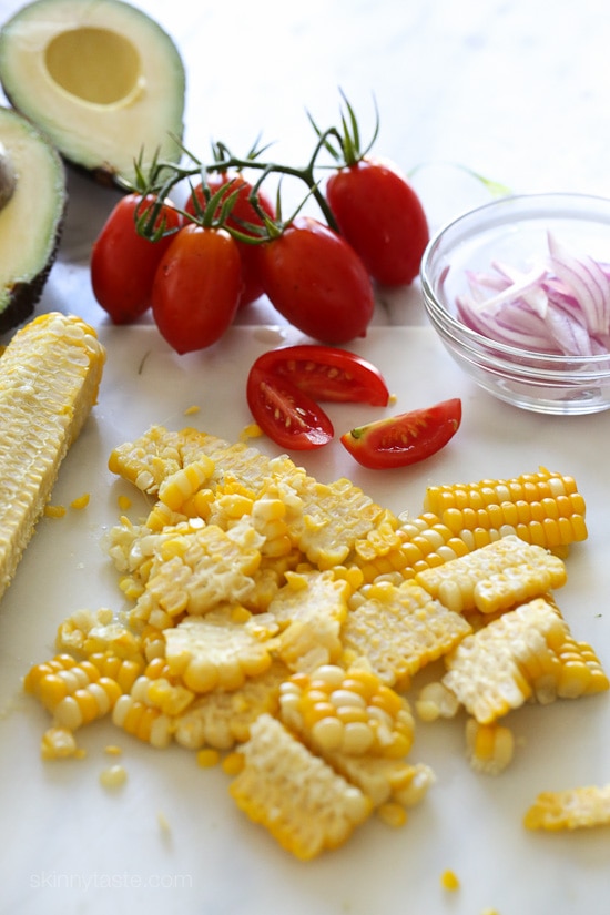 Summer Corn, Tomato and Avocado Salad are delicious topped with a Buttermilk-Dijon Dressing, goes great with anything you're grilling!