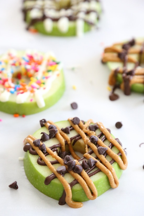 I'm in love with these apple treats, great for the kids or even adults. Drizzled with anything that strikes your fancy, here I did a variation with PB and chocolate as well as some with just chocolate. Caramel would also be great to give you a caramel apple combination!