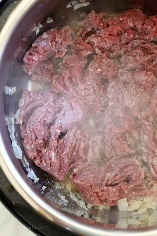 Make meat sauce AND Spaghetti Squash at the same time with this delicious one-pot meal ready in under thirty minutes!