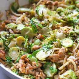 Spiralized parsnips make a wonderful pasta replacement in this satisfying, spicy Autumn dish made with brussels sprouts and spicy chicken sausage.