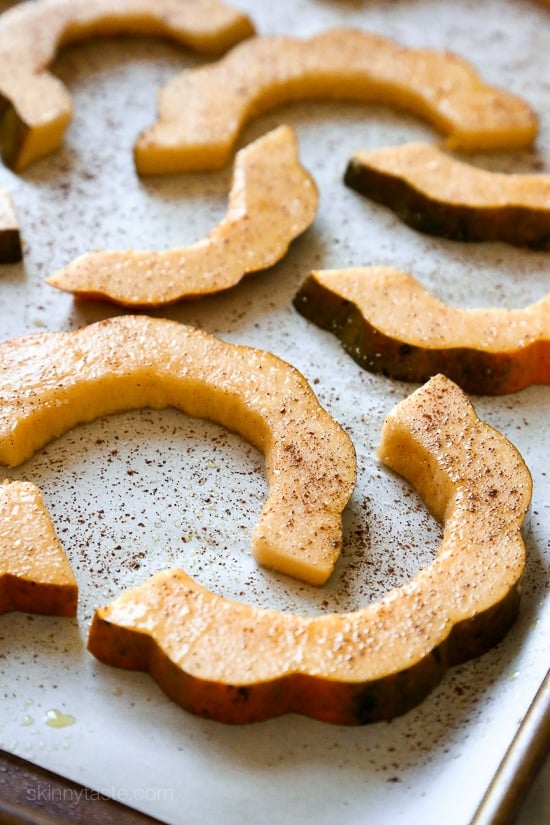 Roasted winter squash, pomegranates and pecans over massaged kale with a light maple balsamic dressing – there is nothing boring about this salad! Rubbing the raw kale with olive oil for a few minutes leaves it tender and takes away the bitterness.