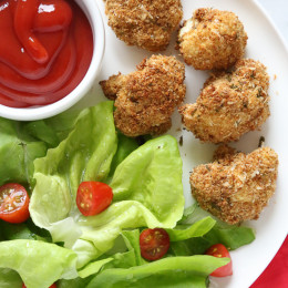 These delicious breaded cauliflower florets are baked in the oven with a parmesan-crumb crust, they remind me of my Moms fried cauliflower I used to love as a kid – without all the frying!