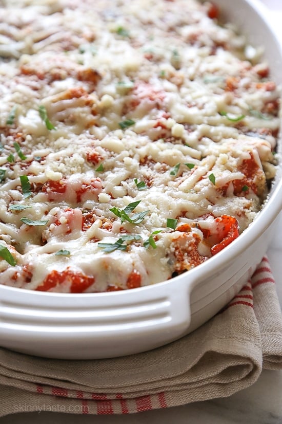 Penne baked with cheese, sauce and loaded with healthy vegetables in every bite. Roasted zucchini, red bell peppers, asparagus, red onion and fennel are tossed with balsamic and herbs then roasted for the best tasting meatless baked pasta dish EVER!