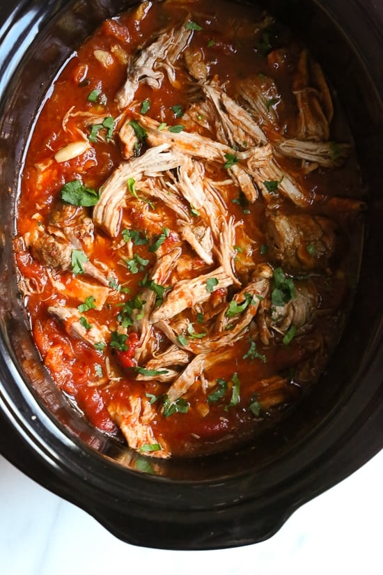 Italian Pulled Pork Ragu is a hearty sauce made with pulled pork, tomatoes, roasted peppers and fresh herbs. Can be made in the Instant Pot, Slow Cooker or Dutch oven.