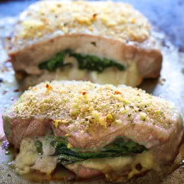 These stuffed pork chops are SO good, inspired my a meal I had at a local Italian restaurant stuffed with prosciutto, mozzarella and baby spinach then topped with garlic and breadcrumbs.