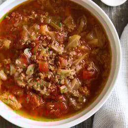 I love this cabbage soup recipe, made with ground beef, vegetables and tomatoes. It's the perfect cold weather soup and makes enough for leftovers.