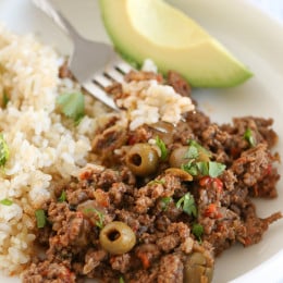 Picadillo is the most requested dish by my kids and it's so easy to make. We love it served over brown rice (or cauliflower rice) with this quick cabbage slaw or a salad on the side.