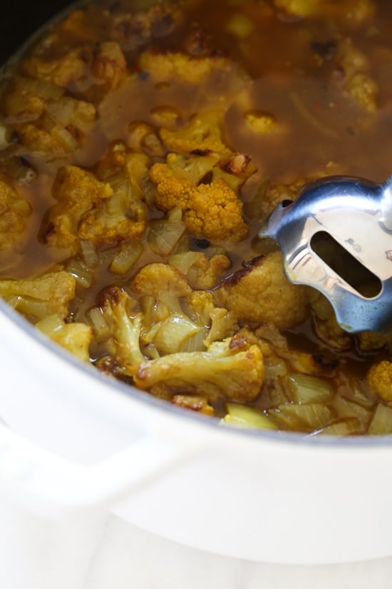 Roasting cauliflower enhances the flavors in this delicious, healthy soup. If you haven't jumped on the turmeric bandwagon yet, this soup is a great place to start! I like to reserve some of the roasted cauliflower as a garnish for the soup.