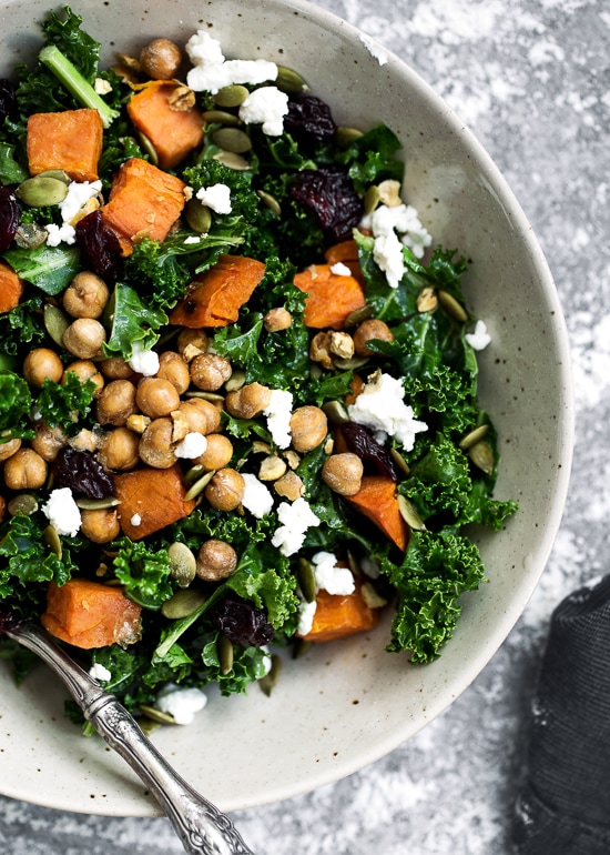 Kale Salad with Roasted Sweet Potato, Dried Cherries, Feta & Pepitas