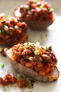 Swapping bread for baked sweet potatoes makes eating a Sloppy Joe so much healthier! This savory-sweet dish is gluten-free, dairy-free, whole30 and Paleo.