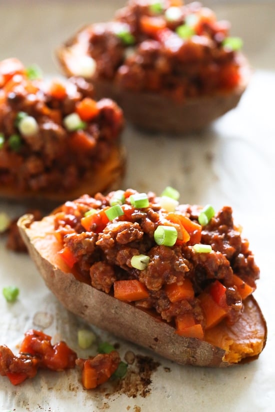 Swapping bread for baked sweet potatoes makes eating a Sloppy Joe so much healthier! This savory-sweet dish is gluten-free, dairy-free, whole30 and Paleo.