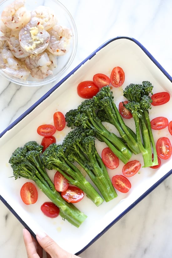 One of my favorite ways to make shrimp is roasted in the oven, it comes out tender and flavorful every time! I added some of our favorite vegetables to make it a meal, and we loved it! A quick and EASY sheet pan dish with tons of flavor, ready in under 3o minutes start to finish!